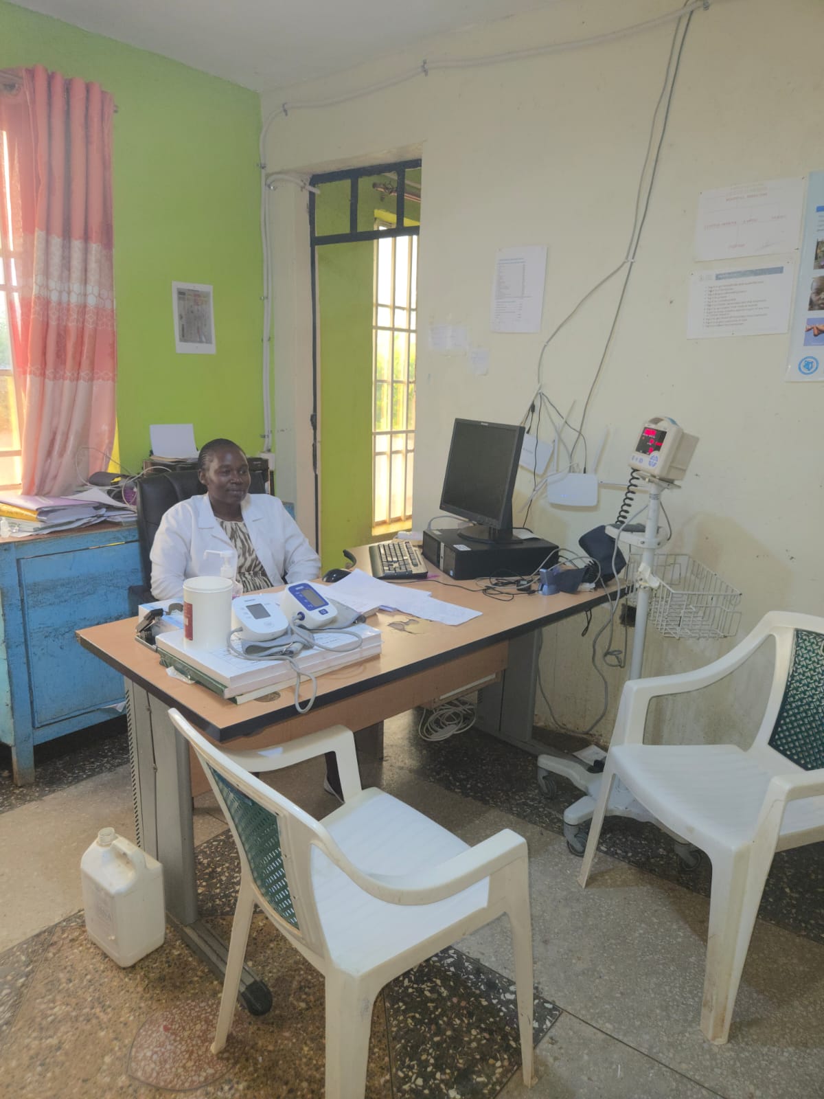 Clinician at Kabati Medicare Health Centre attending to a patient consultation